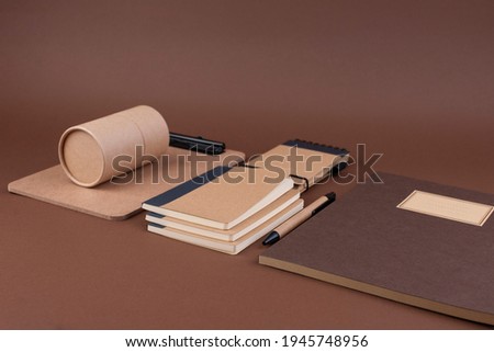 Eco-friendly stationery, many different. Office desk with a paper notepad and a box of pencils. Contemporary workspace for men, minimalist style. Mockup. Copy space. above