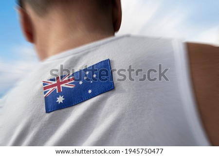 The national flag of Australia on the athlete's back