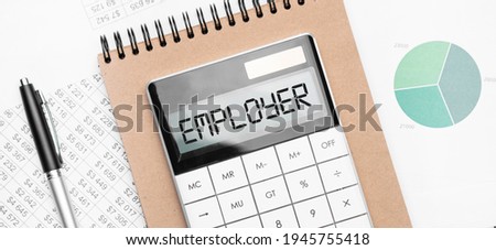 Calculator with text Employer with craft colored notepad pen and financial documents.