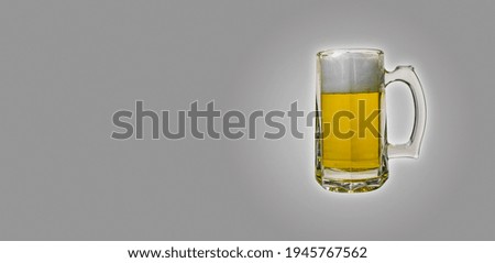 Mug with beer on gray background