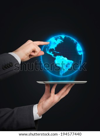 Businessman pointing out the digital globe. Elements of this image furnished by NASA. 