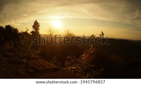 Sunset, mountains and beautiful landscape in Palatinate. Ruins of Wegelnburg castle in Schönau, Germany. 