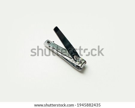 clean stainless nail cutter on the white background, Manicure scissors to clean the foot health.