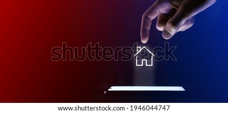 Man finger clicks on the open house icon.House symbol for your web site design, logo, app, UI. Which is a virtual projection from a mobile phone. Neon , red blue lights