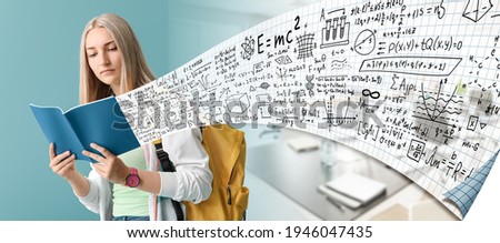 Young woman studying exact mathematical sciences in university. Concept of online education Royalty-Free Stock Photo #1946047435