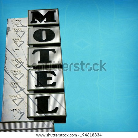 aged and worn vintage photo of retro motel sign with room for text