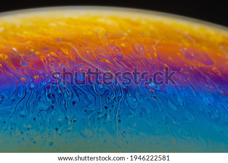 Close up soap bubble with rainbow colours