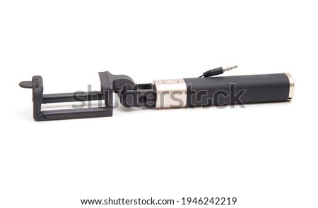 Selfie stick. phone. smartphone. material is black. On white isolated background