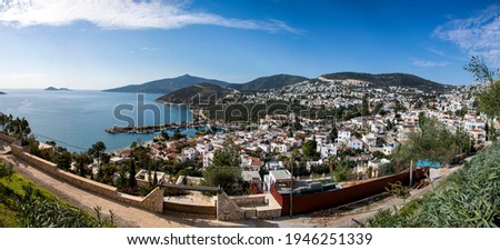 A panaromic photo of Kalkan which is in Turkey Antalya. The natural atmosphere it has mesmerizes it's visitors during summer and the shiny sea welcomes people with it's endless appearance.
