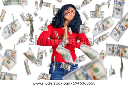 Beautiful african american woman wearing casual clothes begging and praying with hands together with hope expression on face very emotional and worried. begging.