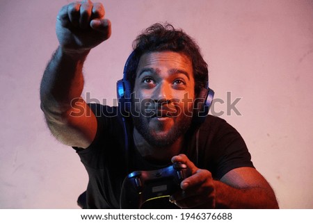 Boy playing video game with Joystick and imagining he is in sky