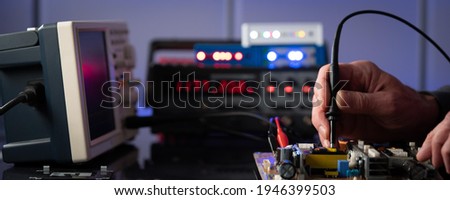PCB witch microcontroller in electronics laboratory Royalty-Free Stock Photo #1946399503