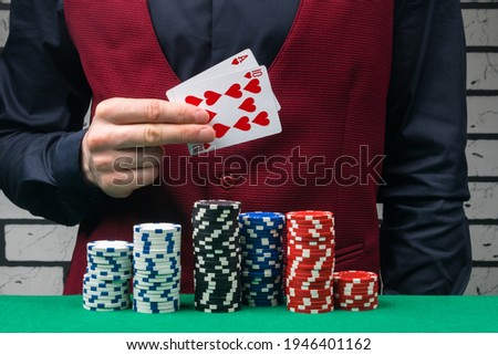 the dealer's hand is a winning combination of cards