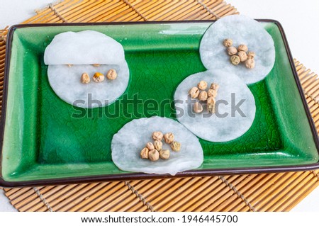 Pre-soaking the seeds before planting to germinate seeds for home gardening and growing plants at home. Seeds in a moist environment on the windowsill