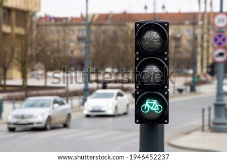 Green traffic lights for bicycles in the city. Green light for sports concept. Healthy living and sustainable transportation for healthier life, clean planet and reduction of carbon emission. 