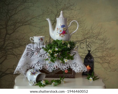 Spring evening with tea table and wildflowers