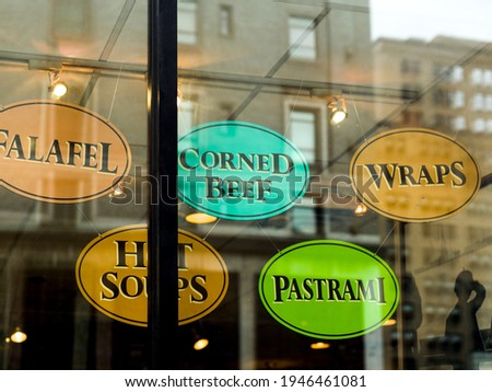 Close-up of signs in a display window of restaurant, Midtown Manhattan, New York City, New York State, USA