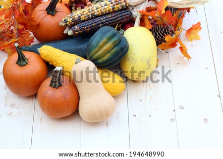 Harvest decoration for Thanksgiving with pumpkin, squash, corn