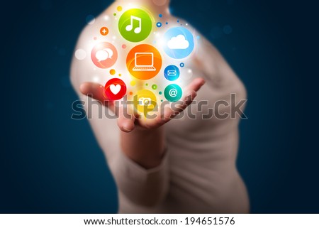Young beautiful woman presenting colorful technology icons and symbols