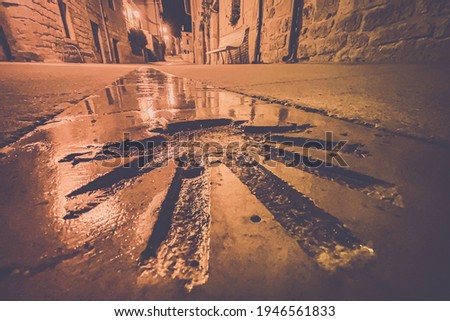 Night View of a Scallop Shell Engraving on a Street in Hontanas Marking the Way of St James - Camino de Santiago