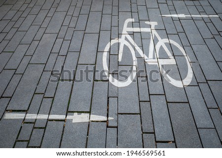 Bicycle logo, symbol or pictogram on bicycle lane.