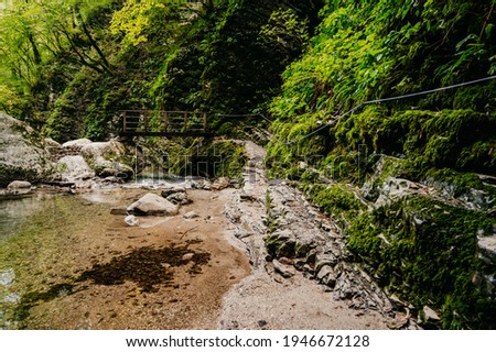 Kozjak waterfall one of the beautiful waterfall in Slovenia. Popular place to vitis near river soca, kobarid. Kozjak slap Royalty-Free Stock Photo #1946672128