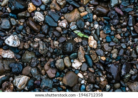 little river rocks texture background 
