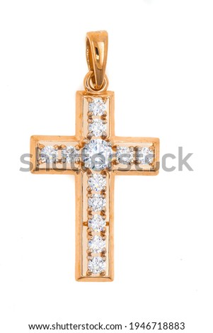 Jewelry cross made of red gold with diamonds. Pendant christian symbol of religion isolated on white background.