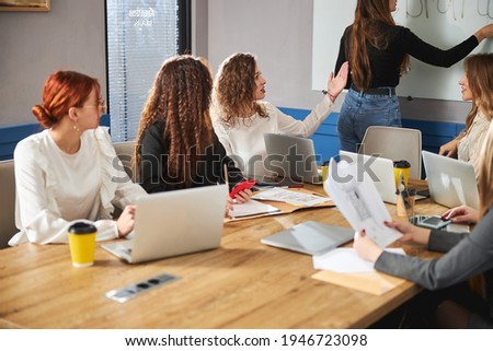 Creative business team working on project in office