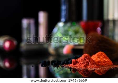 cosmetics isolated on black background