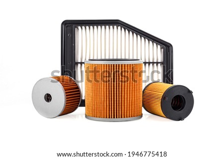 Auto parts accessories : Oil , fuel or air filter for engine car isolated on white background.	 Royalty-Free Stock Photo #1946775418