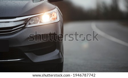 Front grill, headlights. Luxury stylish sport car banner. Royalty-Free Stock Photo #1946787742