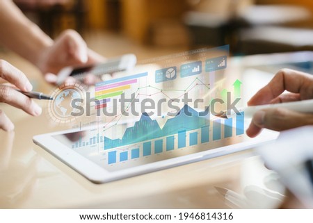 Businessman investment consultant analyzing company financial report balance statement working with digital augmented reality graphics. Concept for business, economy and marketing. 3D illustration.  Royalty-Free Stock Photo #1946814316