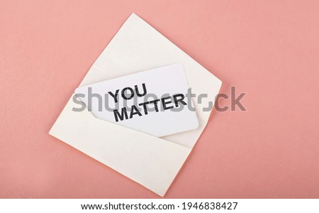 Word Writing Text You Matter on the card on the pink background