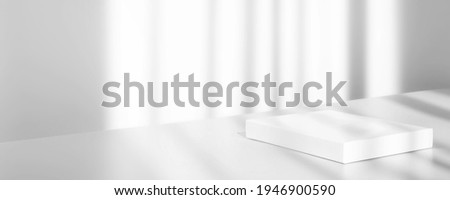 Abstract empty white podium on white background with shadow. Mock up stand for product presentation. 3D Render. Minimal concept. Display product. Banner Royalty-Free Stock Photo #1946900590