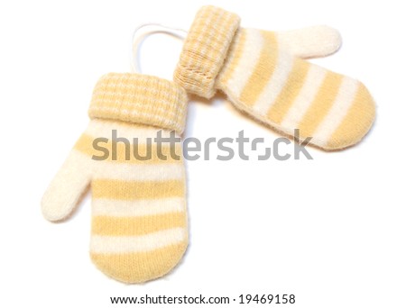 Two winter wool warm mittens on isolated background.