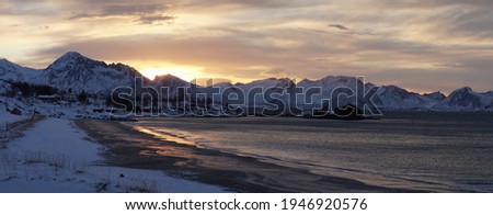Sunset on a cold winter day in Senja on the Lofoten Islands in Norway.