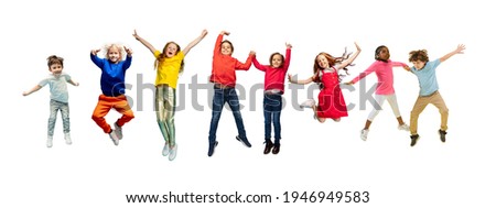 Little and happy kids gesturing isolated on white studio background. Human emotions, facial expression concept