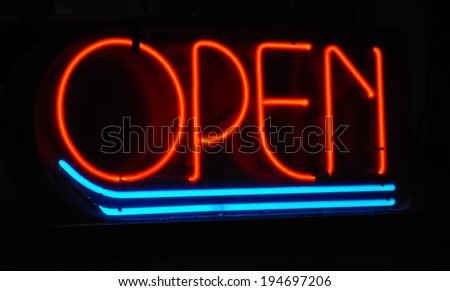 neon sign stating open