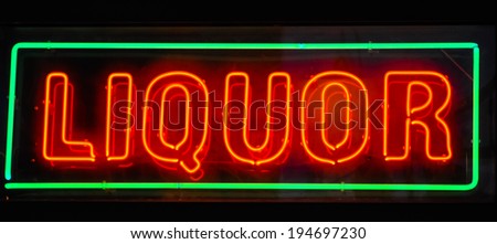 neon liquor sign at a bar