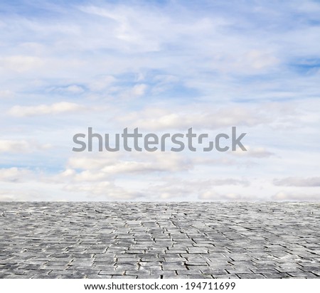 background with cobbled streets and sky
