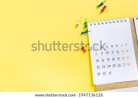 White blank 2021 calendar on solid yellow background with copy space, business meeting schedule, travel planning or project stage and reminder concept.