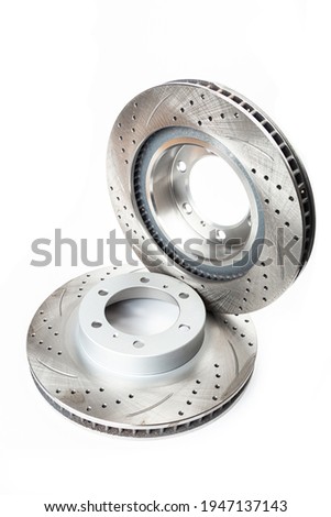 Perforated improved brake discs isolated on white background