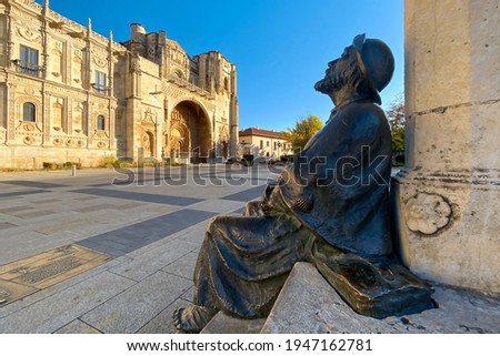 Statue of Pilgrim Looking at the Parador and San Marcos Church in León along the Way of St James Pilgrimage Trail Camino de Santiago