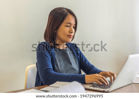 Asian businesswoman working at home during covid 19 outbreak