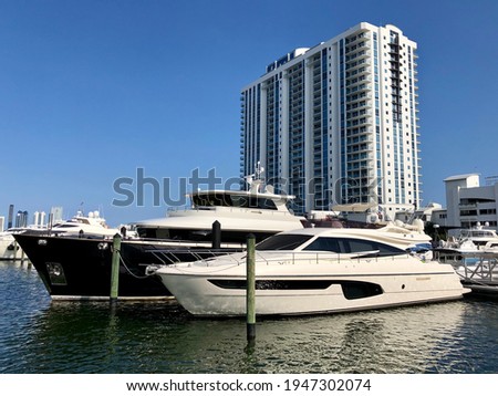 Photo of Marina Palms luxury condo development in North Miami Beach. The view is of Maule Lake and Sunny Isles Beach skyline. 