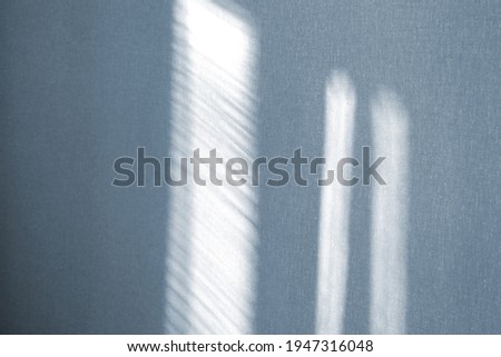 Sun glare on the wall. The sun's rays fall through the window onto the wall. Sunlight in the room.