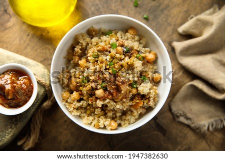 Healthy quinoa with chickpeas and vegetable sauce
