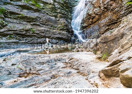 Summer waterfalls along the trails of Sappada. Friuli. Dolomites