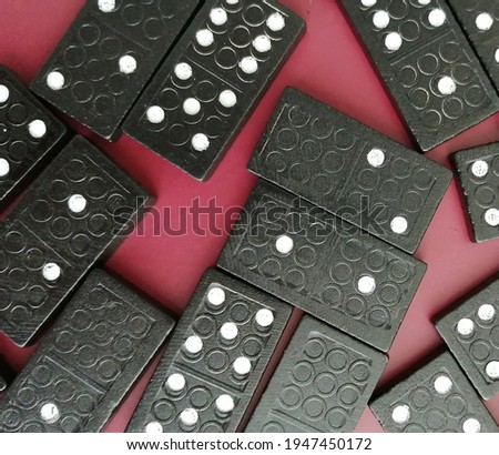Domino blocks on a red background